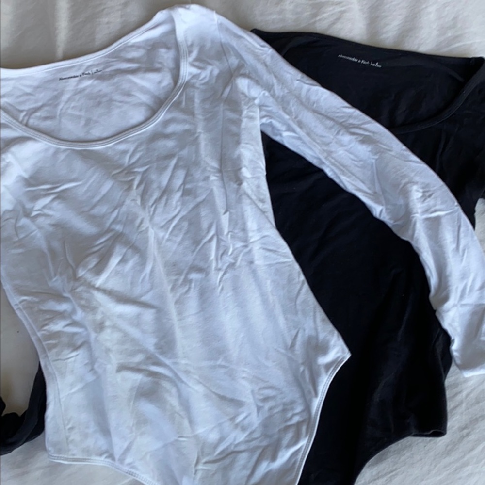 White and black Abercrombie long sleeve bodysuits